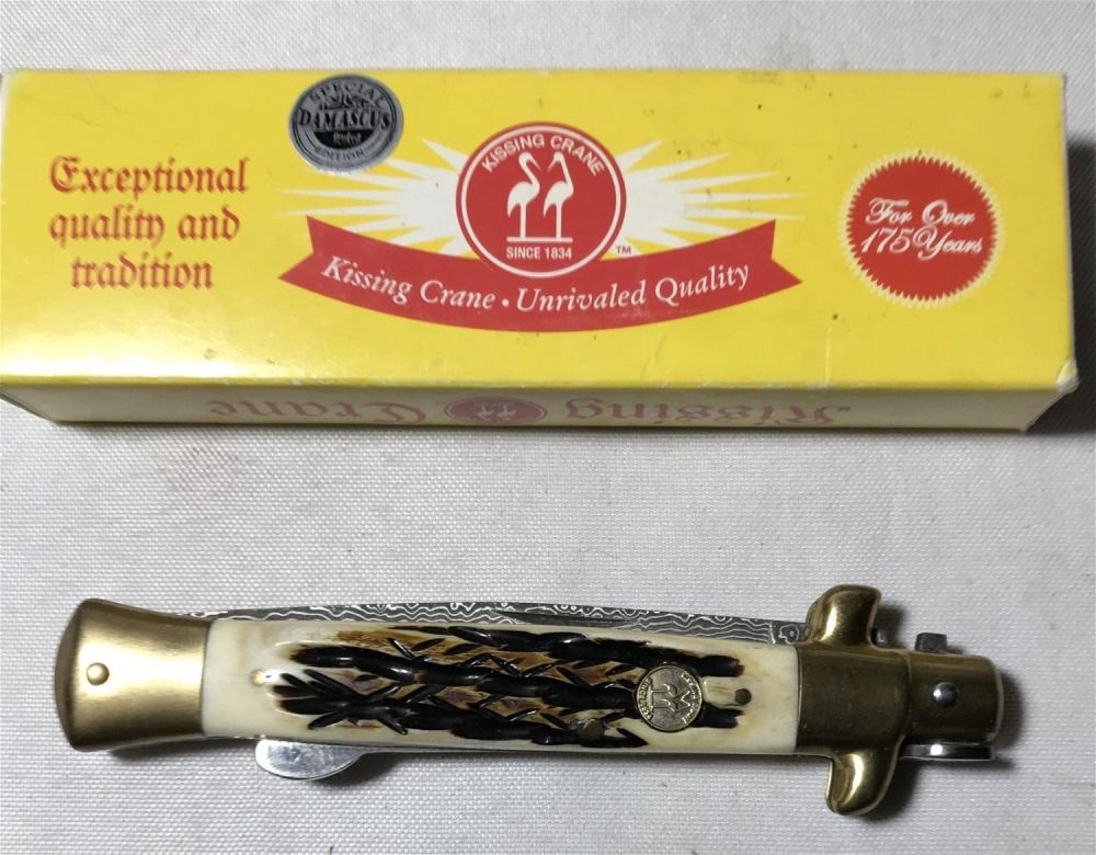 Lot 206: Kissing Crane Pocket Knife in org box .