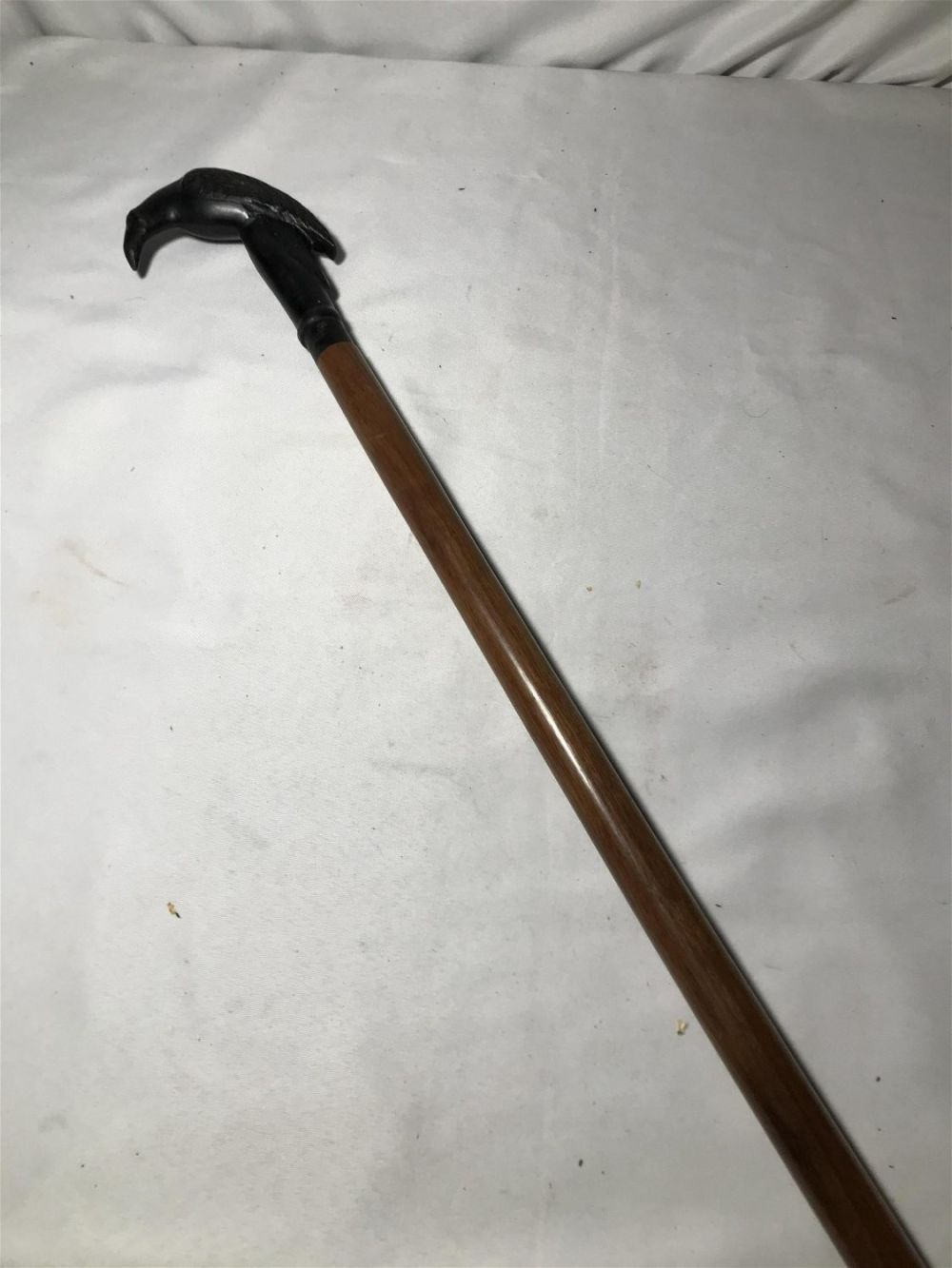 Lot 209: Vintage Cane with Metal Bird Handle .