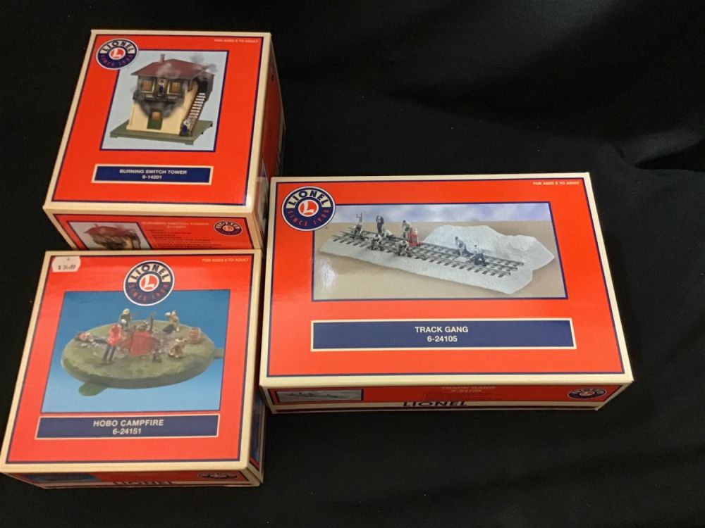 Lot 210: Lionel O Scale Lot of 3 Track Gang 6-24105 Burning Switch Tower 6-14201 Hobo Campfire 6-24151