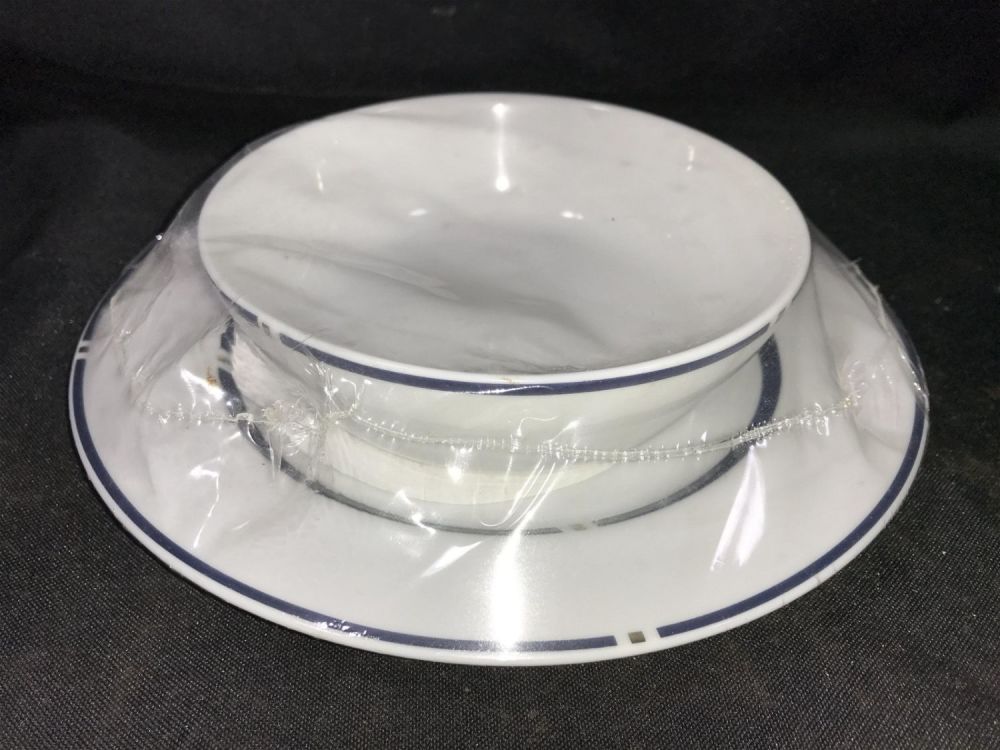 Lot 280: American Airlines Dessert Bowl & Plate Never opened! Bowl measures 7.5 inches diameter