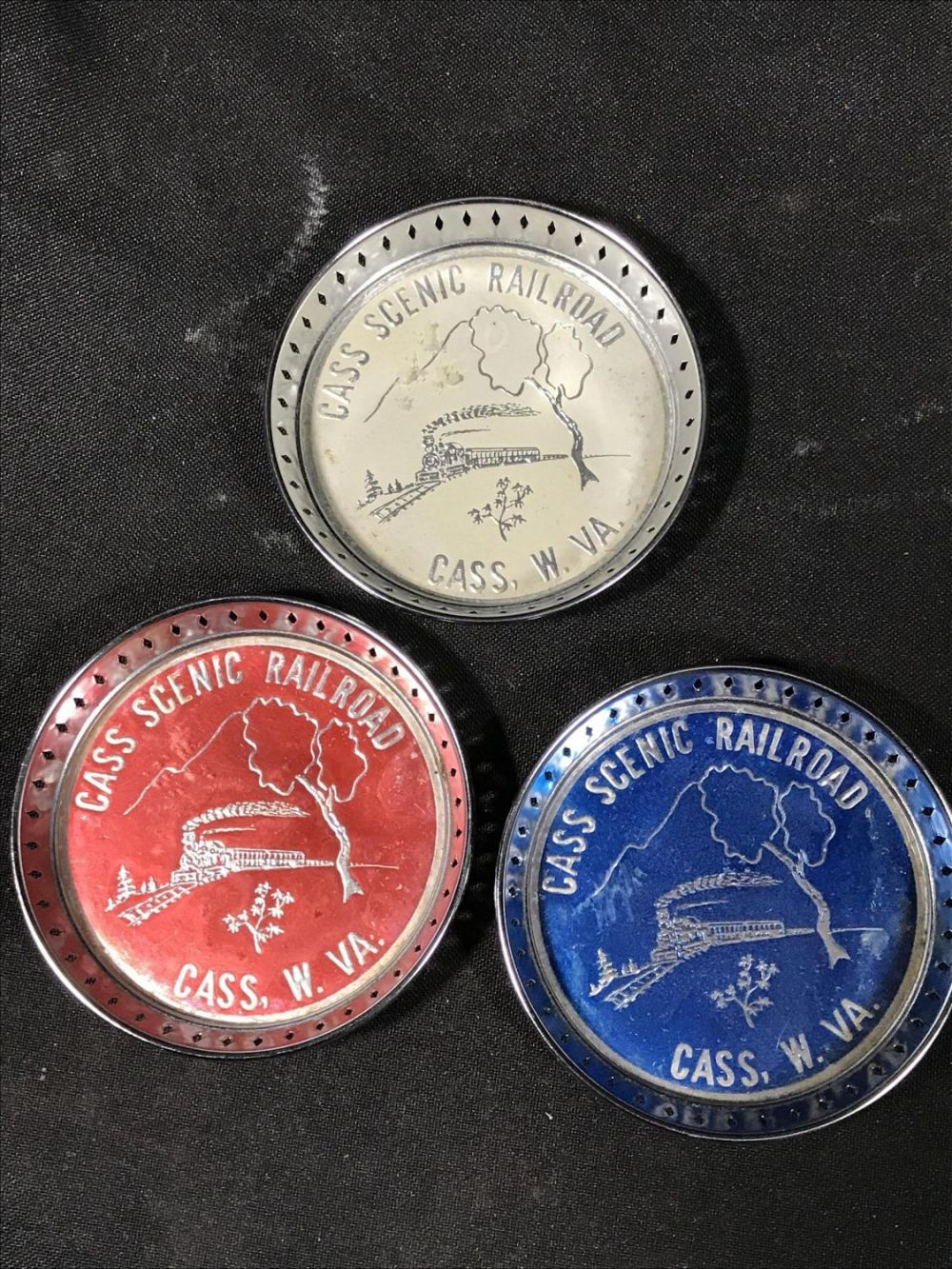 Lot 281: Case Scenic Railroad Each measures 3 inches diameter