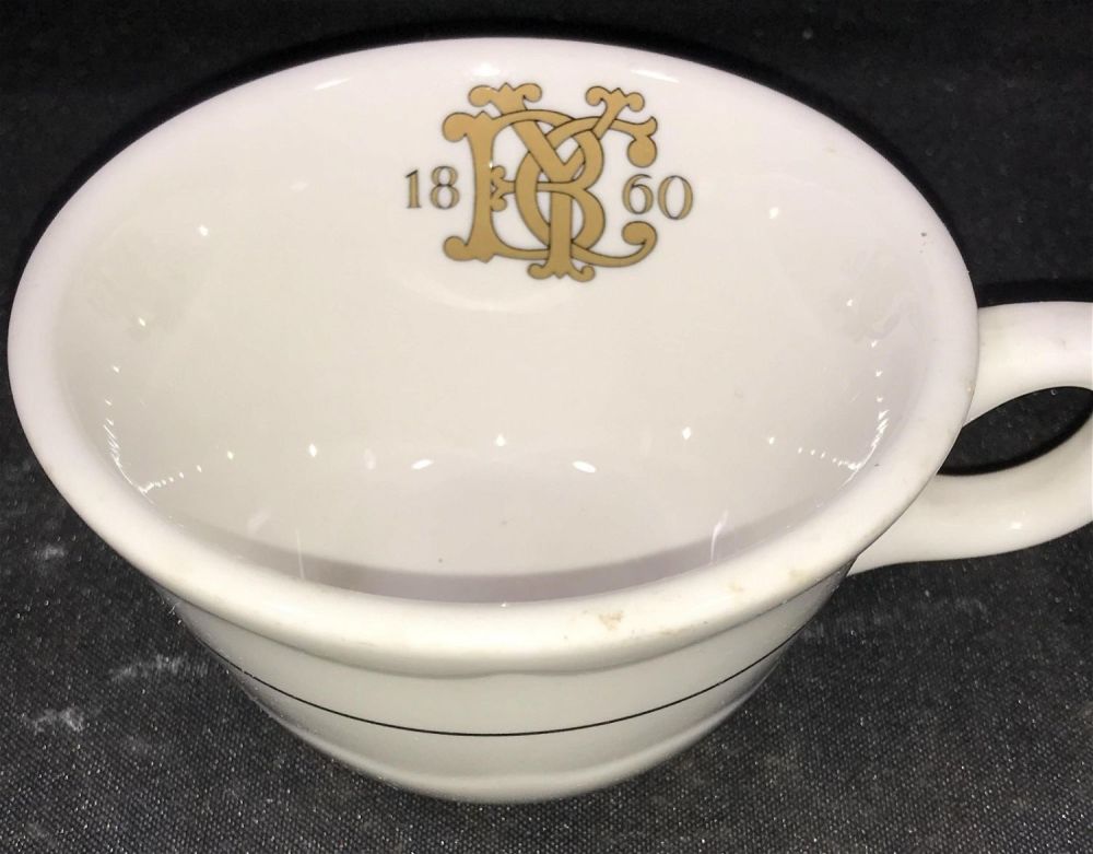 Lot 284: BYC Coffee Cup Measures 5 inches across with handle