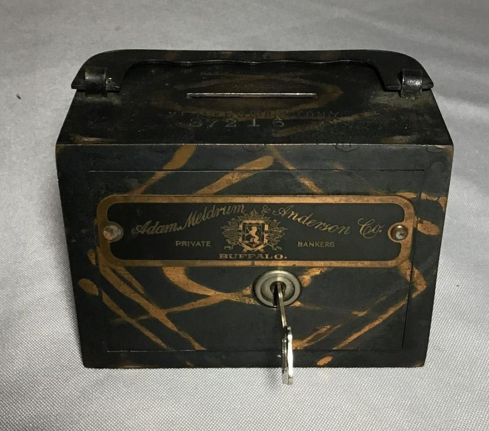 Lot 156: Vintage AM Anise Company Bank of Buffalo w/ Key