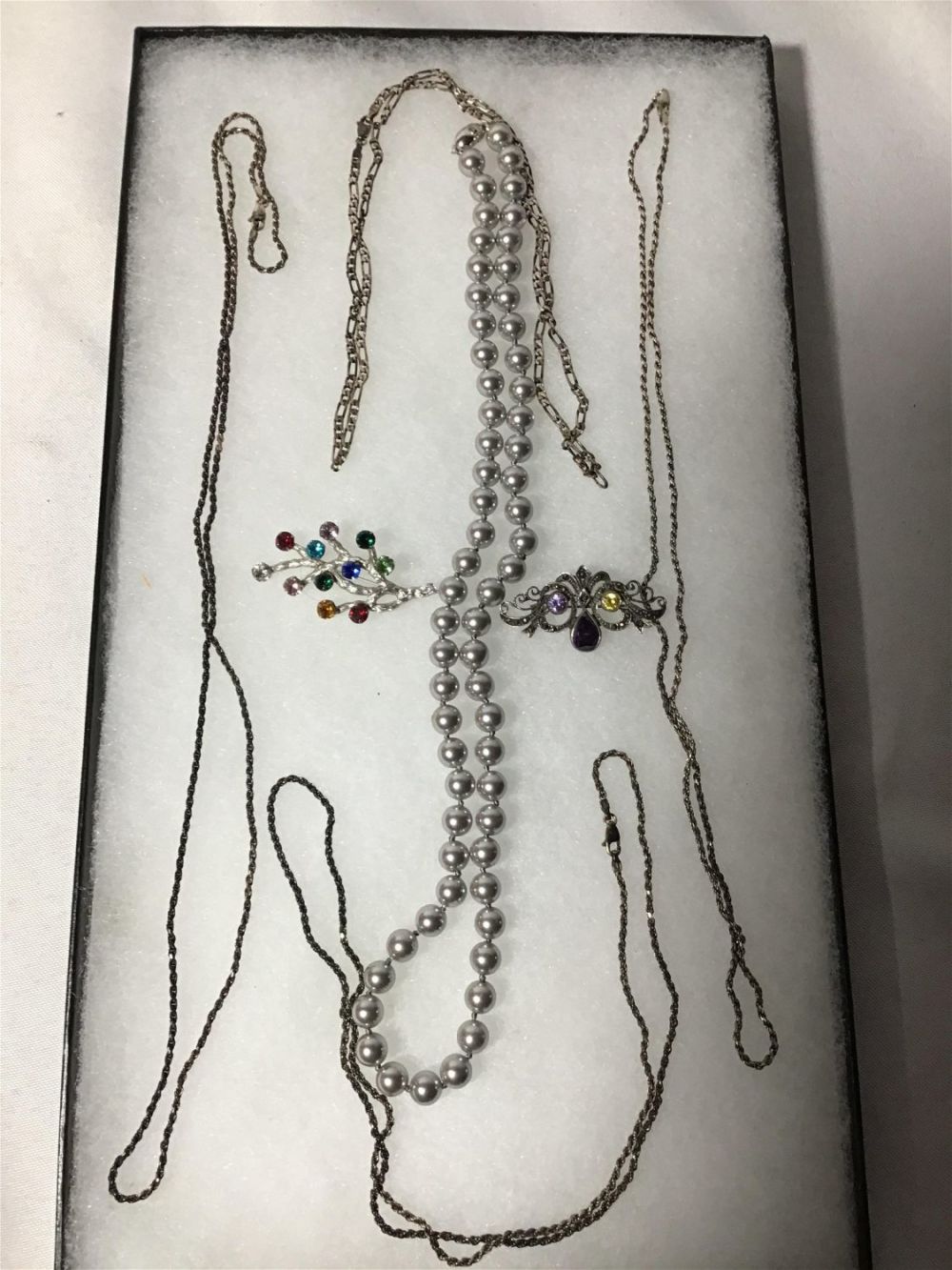 Lot 174: Sterling jewelry and 2 broaches