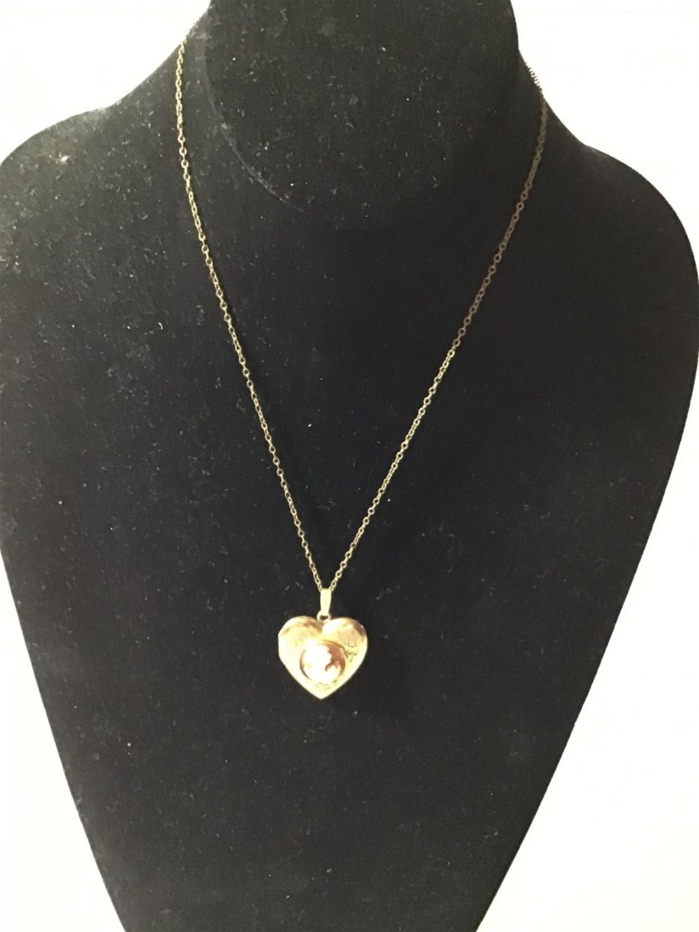 Lot 176: Gold Filled chain with locket