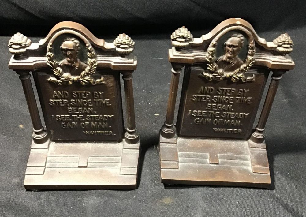 Lot 191: Bradley and Hubbard cast-iron bookends