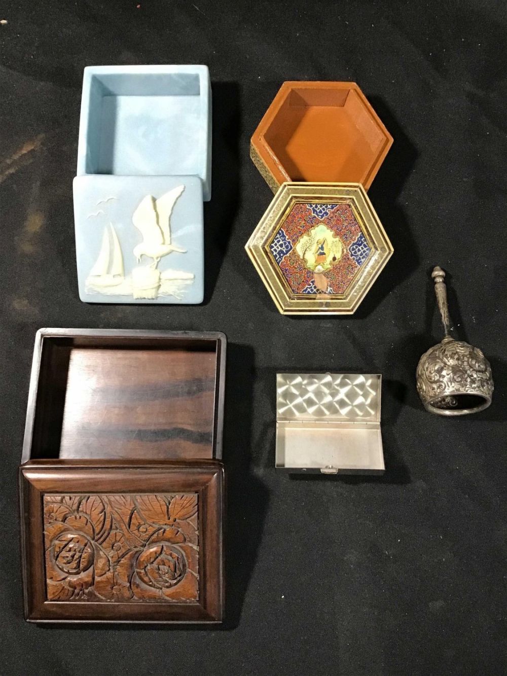 Lot 204: Four Small decorative jewelry boxes with servants