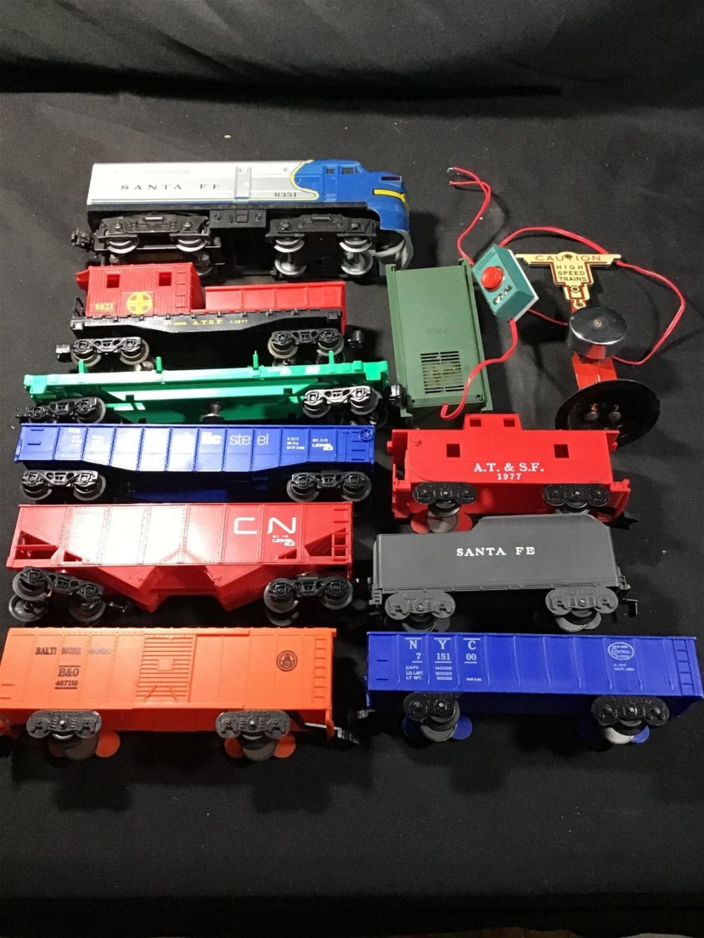 Lot 209: Collection of one coal car,one caboose Six