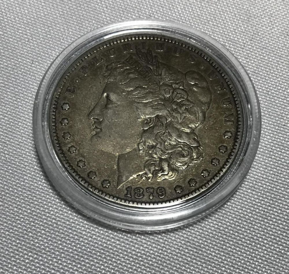 Lot 253: Morgan head silver dollar 1879