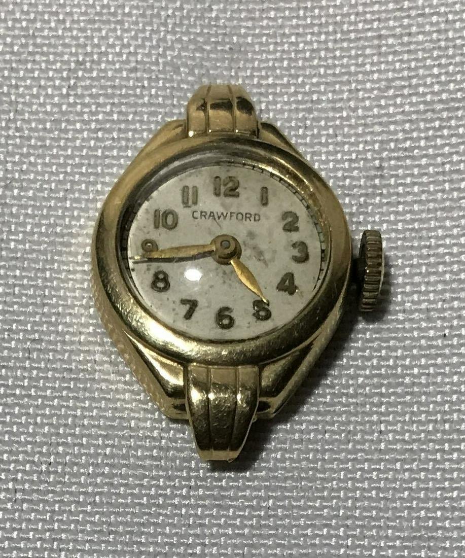 Lot 265: 14 karat gold womenâ€™s watch made by Crawford Non