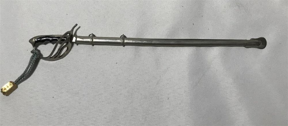 Lot 267: Vintage sword letter opener with sheath