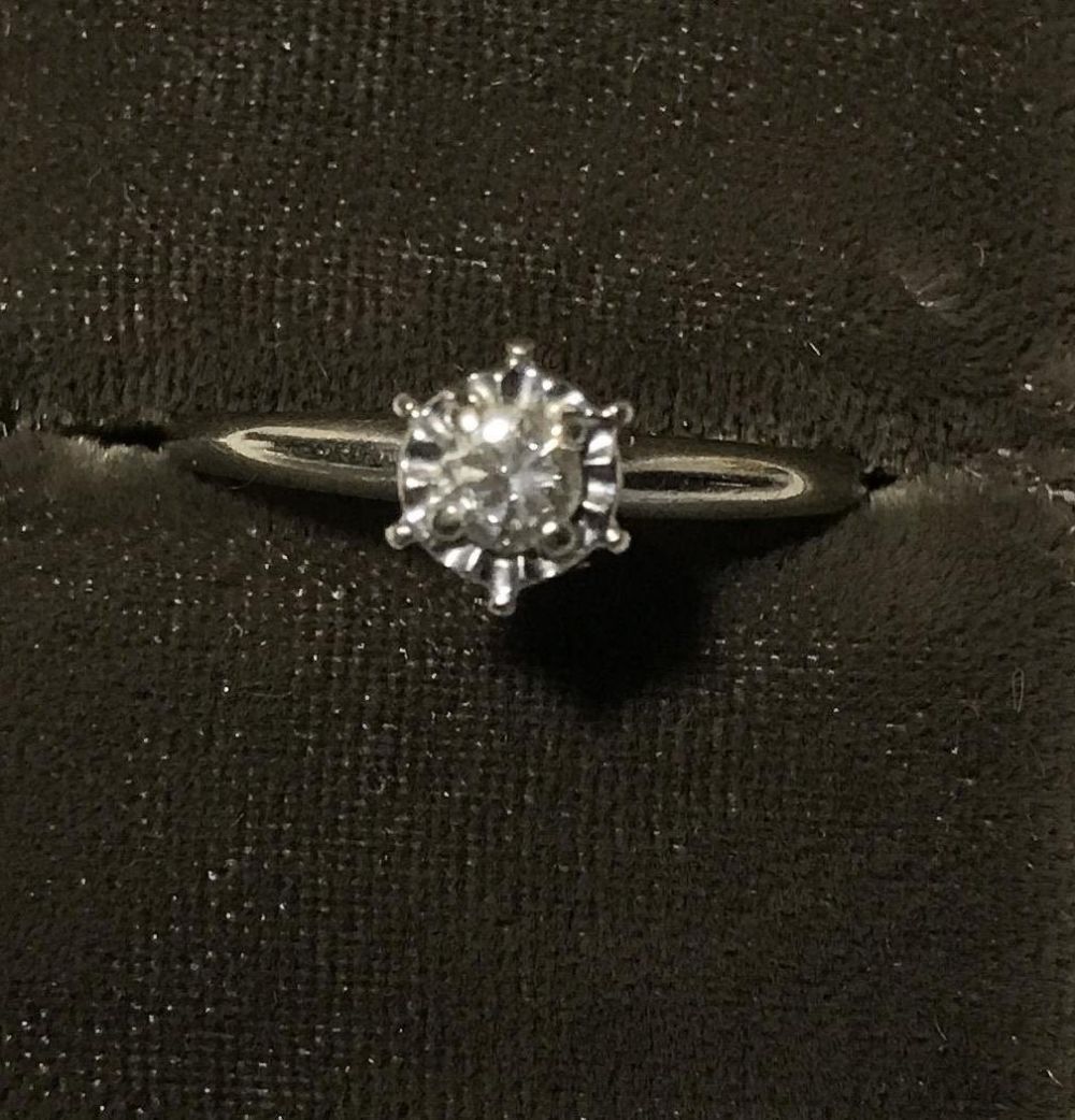 Lot 269: 14 karat white gold  "Jewels of joy" engagement