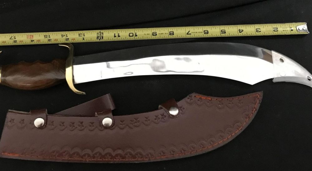 Lot 217: Pakistan Large Blade Knife with leather sheath