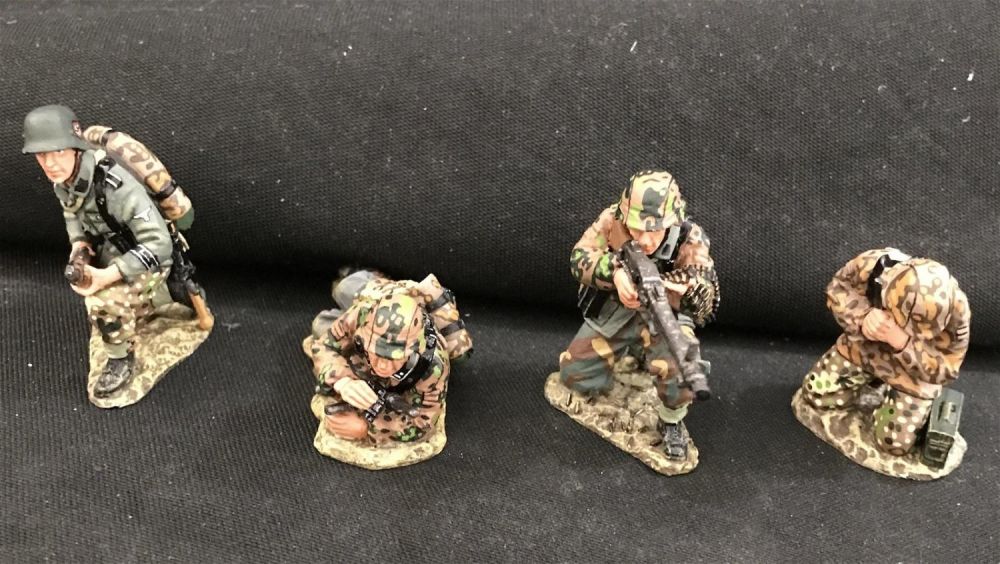 Lot 232: WS51 Four German WAFFENSS soldiers