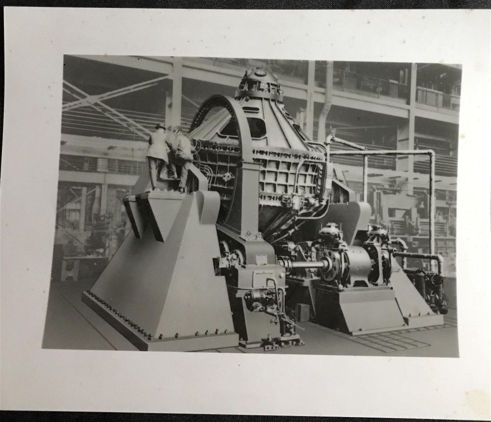 Lot 201: Black-and-White Picture of Large Power Generator