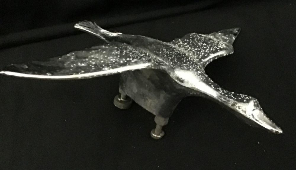 Lot 230: Vintage duck hood, ornament chrome