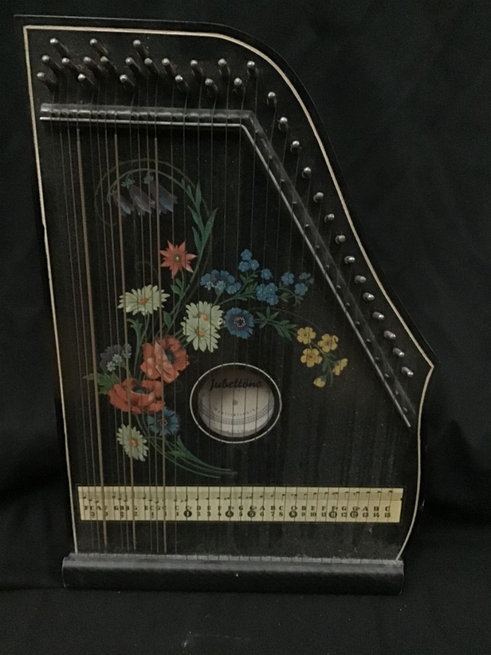 Lot 234: Vintage Childrenâ€™s zither 12 with by 2.75 deaths