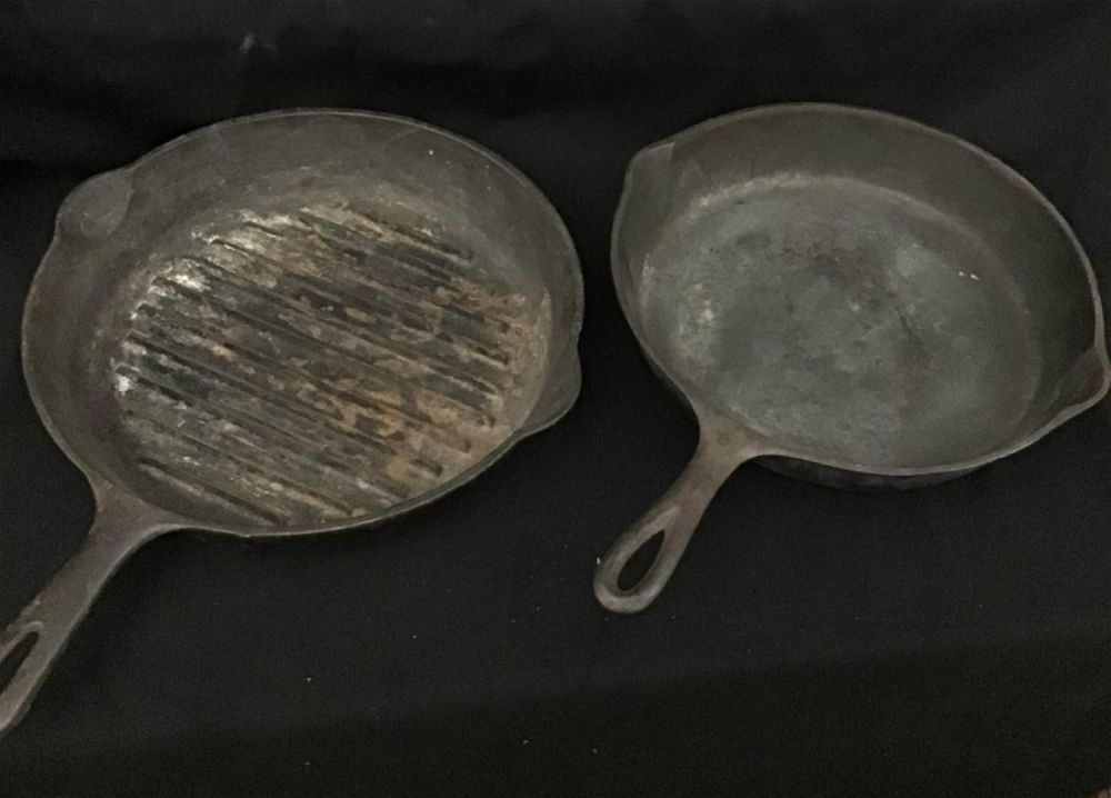 Lot 242: Two cast-iron skillet 11 inch and a number eight