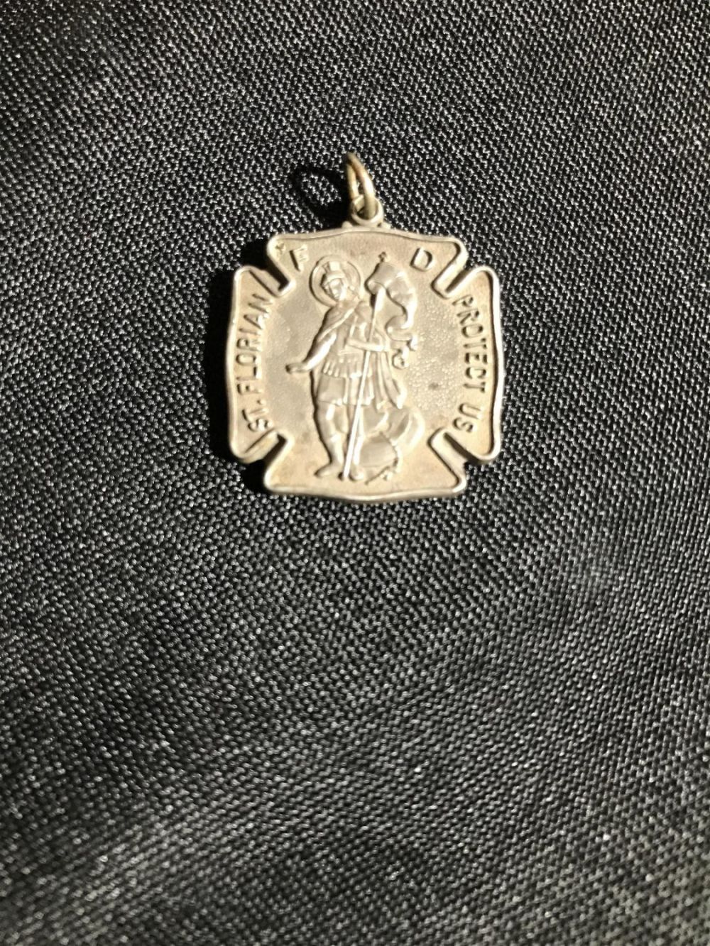 Lot 204: Saint Florian Fire Department "protect us" metal