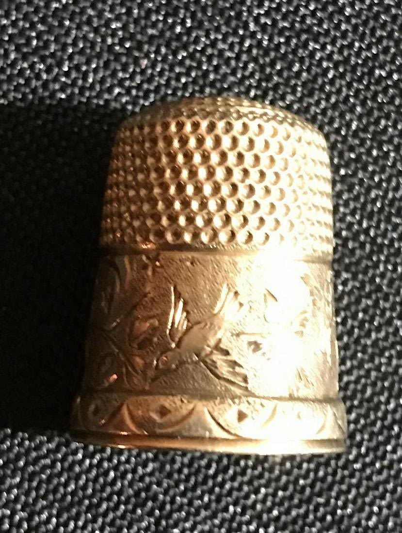 Lot 212: 14 karat Vintage Engraved Thimble with Birds, size 7