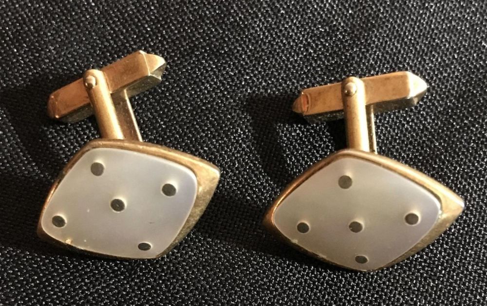 Lot 238: Costume Cufflinks .