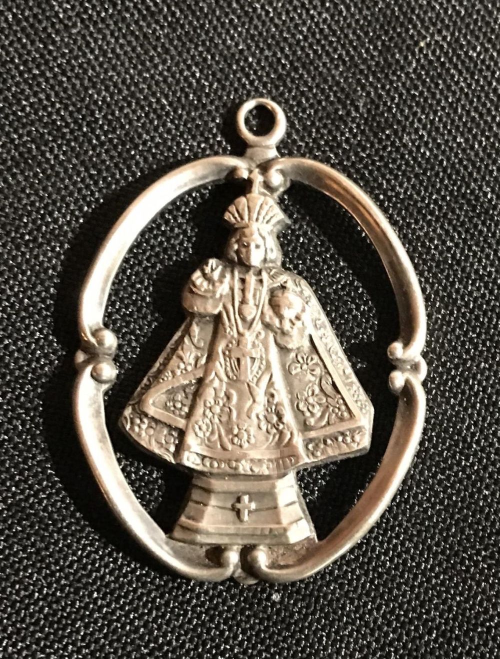 Lot 242: Creed, Sterling, Infant of Prague, 1 inch across .
