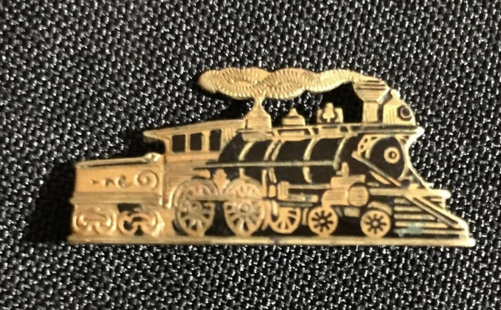 Lot 246: 10 KT  Train Pin with Black Enamel Overlay Long hinge
