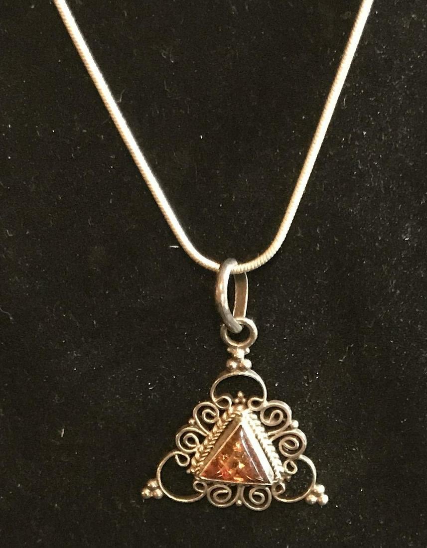 Lot 247: 19 inch vintage, Amber Necklace & Pendant .