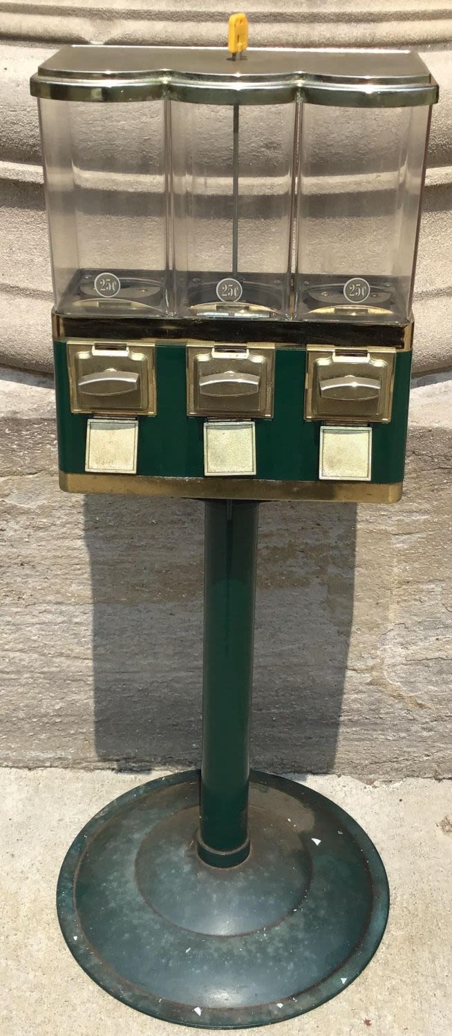 Lot 269: Vintage Sectional Triple Load Gum Machine Use this to get money from your children!