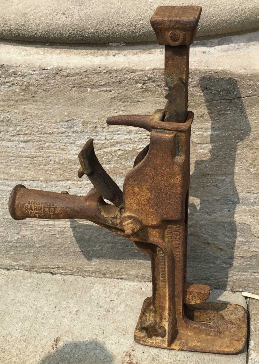 Lot 298: Vintage Industrial Jack Measures 29 inches tall by 20 inches wide