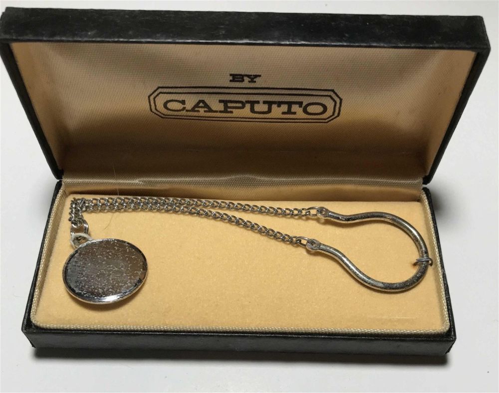Lot 163: Decorative Caputo Keychain in case .