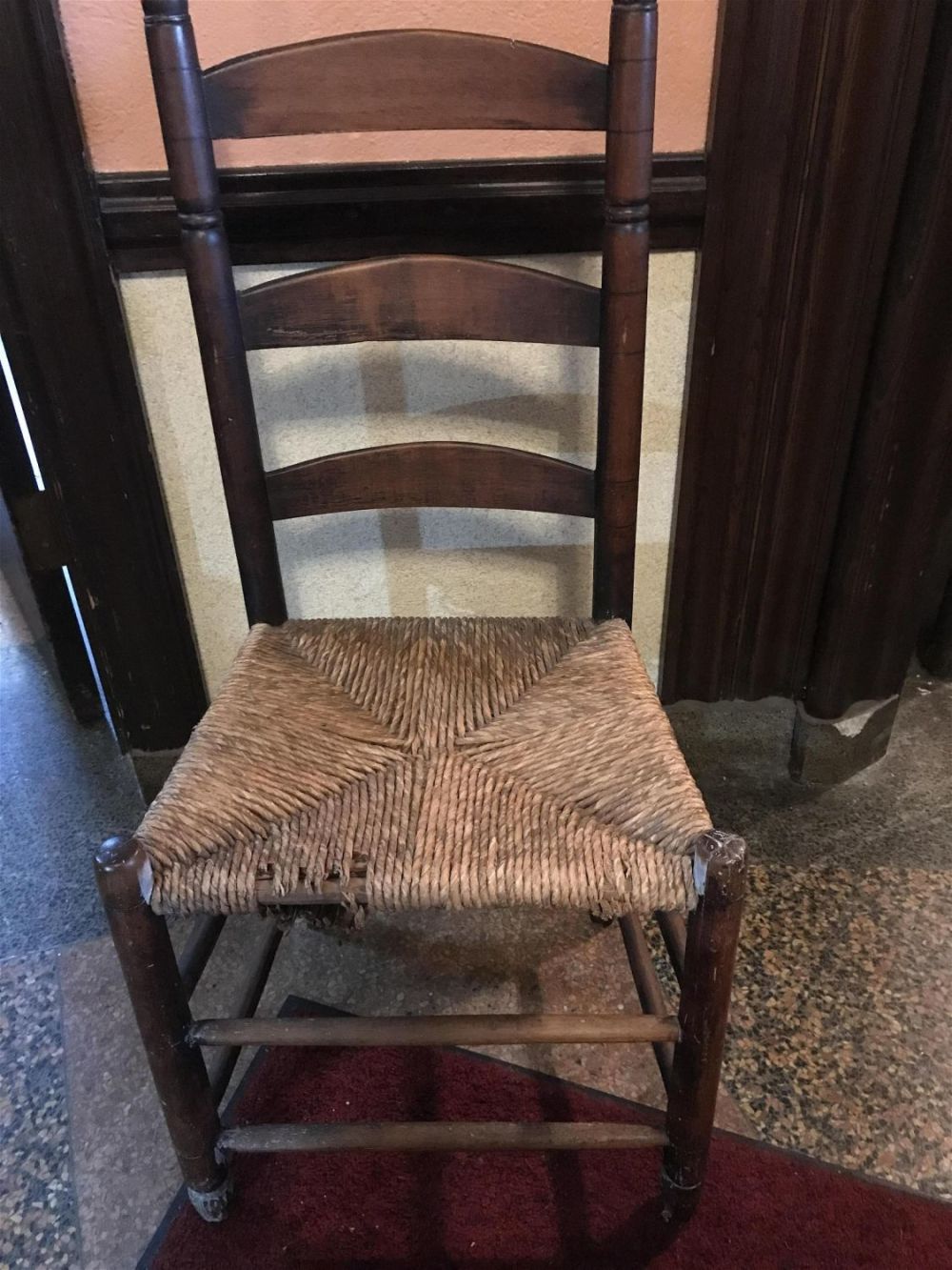 Lot 174: Early Woven Seat Ladderback Chair Measures 38 high 17 1/2 wide 14 deep