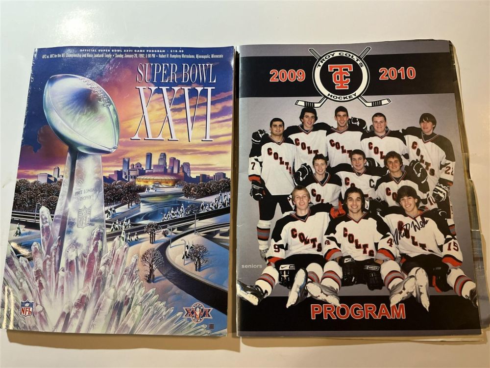 Lot 186: Super Bowl XXI Game Program With 2009 Troy Colts Program