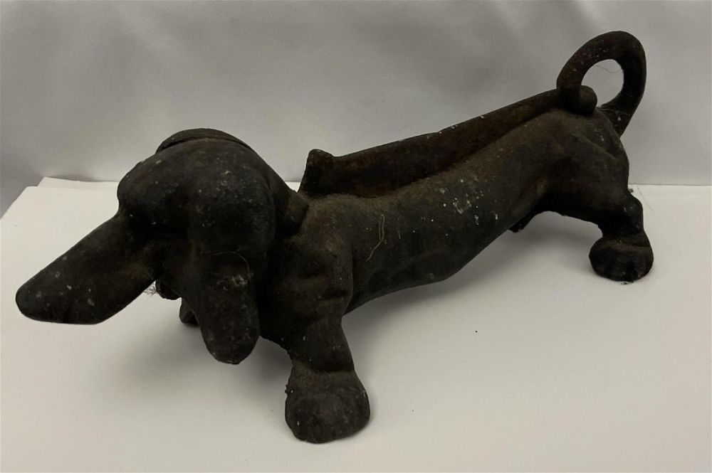 Lot 201: Vintage Cast Iron Dog Boot Scraper Measures 13 inches height by 4 1/2 inches