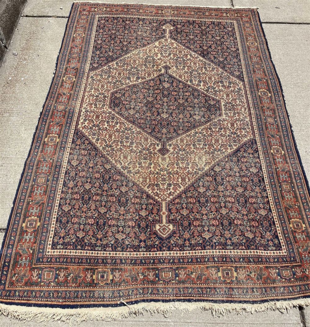 Lot 212: Vintage Woven Rug Measures 53 x 77â€
