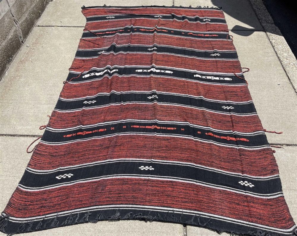 Lot 214: Vintage Blanket from Morocco measuring 61 x 102 .