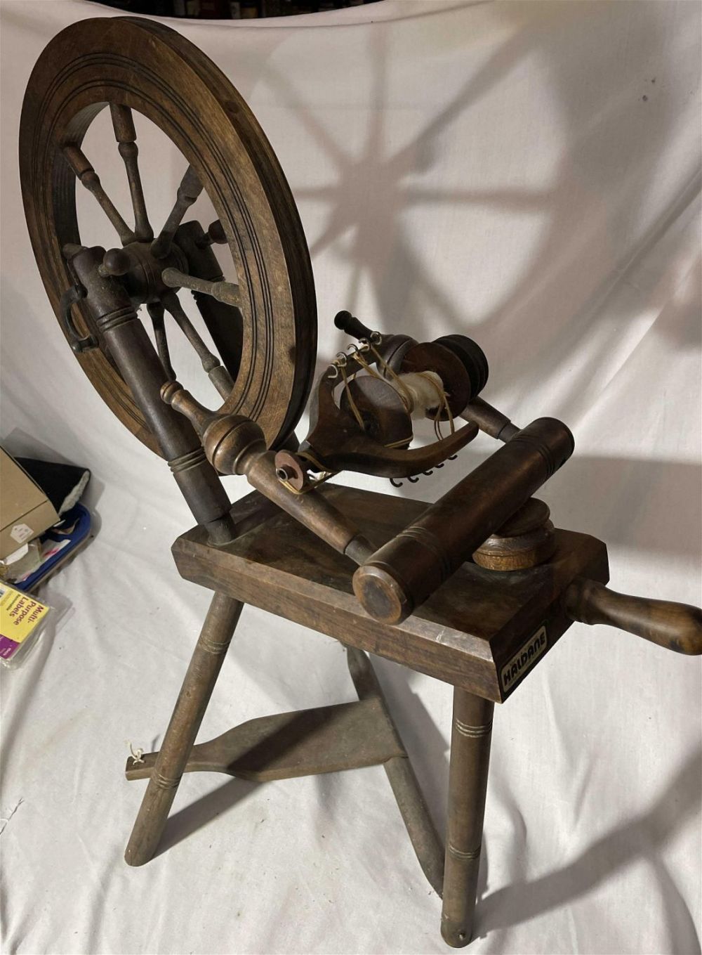 Lot 224: Haldane Scottish Wooden Spinning Wheel Measures 33 inches tall length 30 inches depth 16 inches