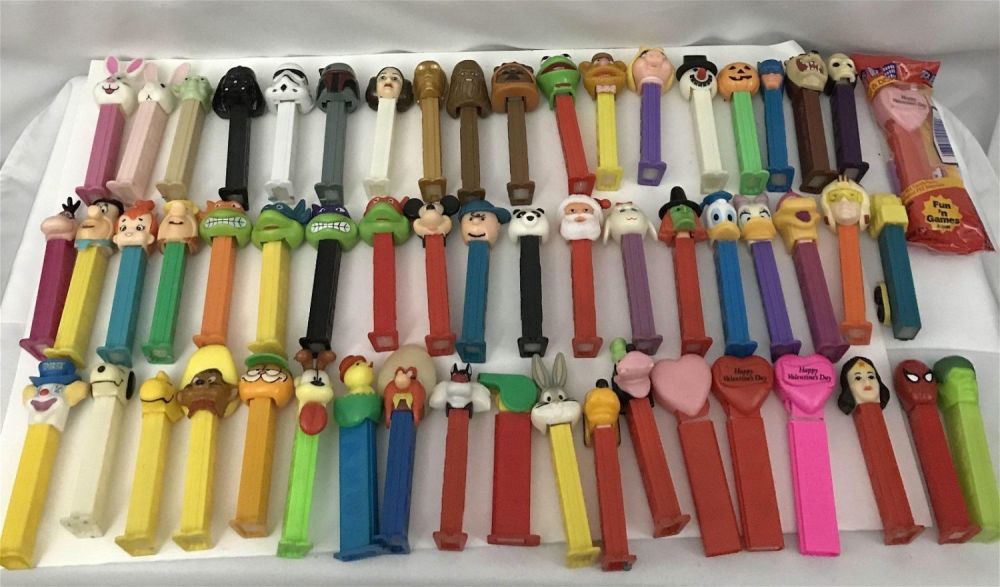 Lot 292: Pezz Dispenser Collection (appr. 57 dispensers) Take a look, youâ€™ll recognize quite a few!
