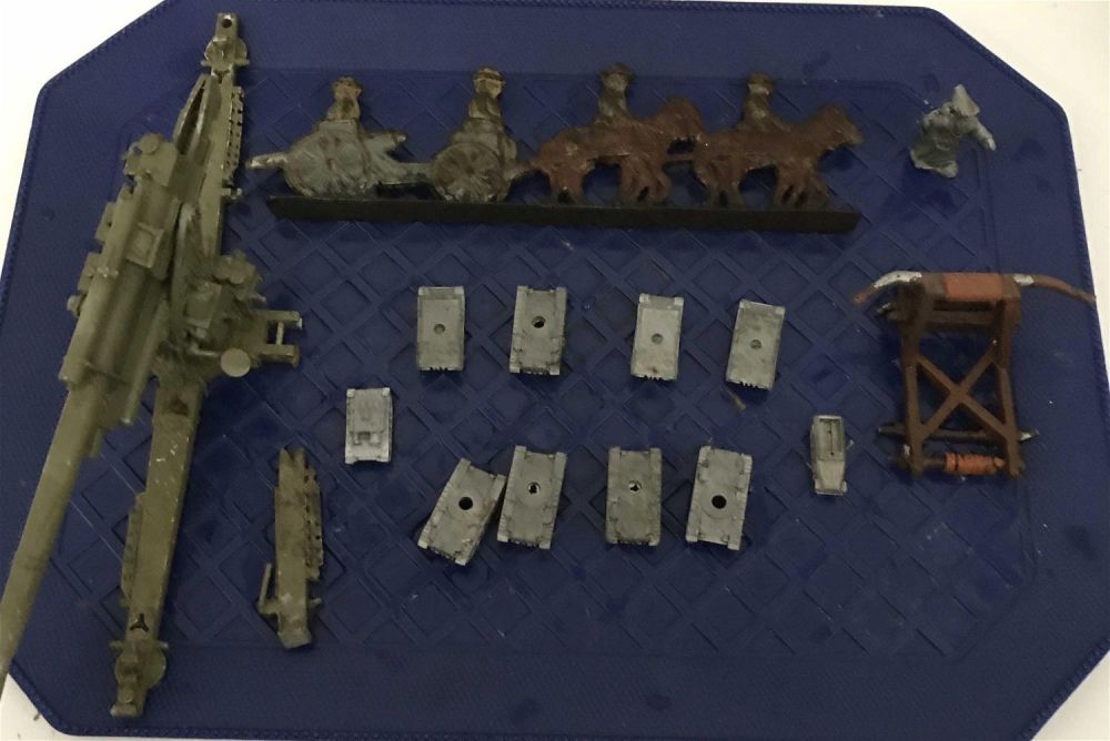 Lot 293: Lead Military Toy Collection Includes cannon, horses, pulling canon And bottoms of tanks