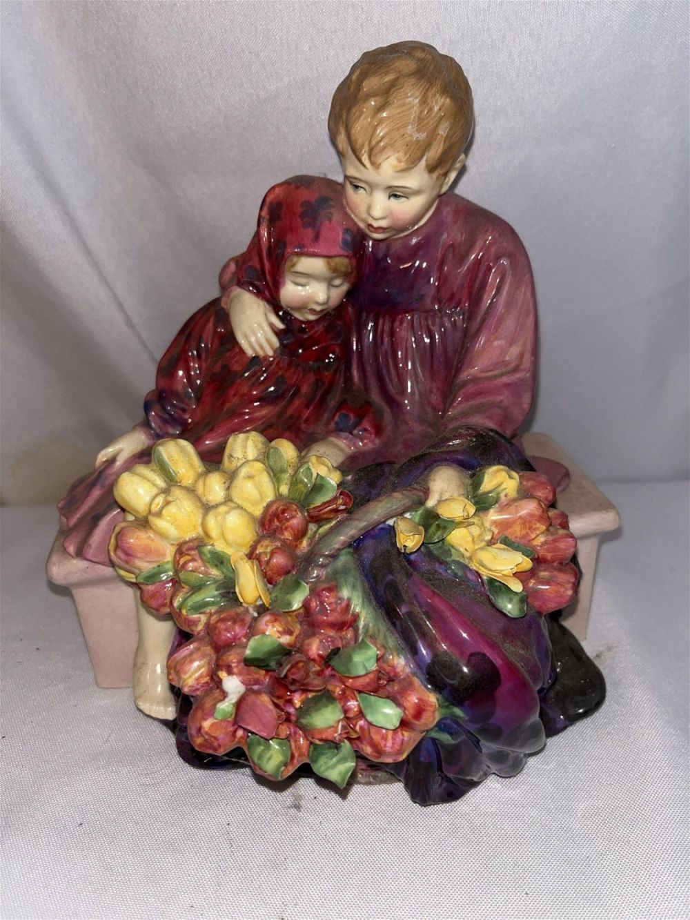 Lot 206: Royal Doulton Flower Sellers Children