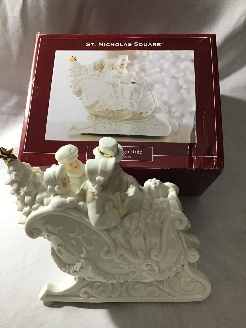 Lot 237: St Nicholas Square Family Sleigh Ride Music Box