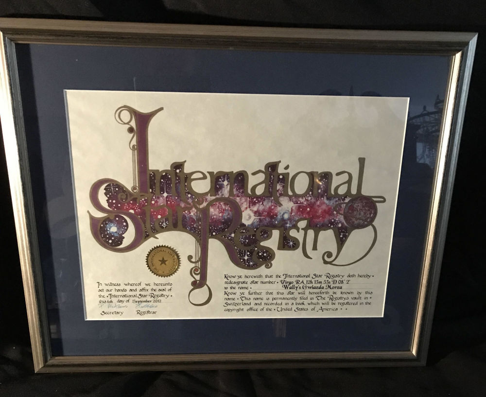 Lot 183: Framed international star registry certification