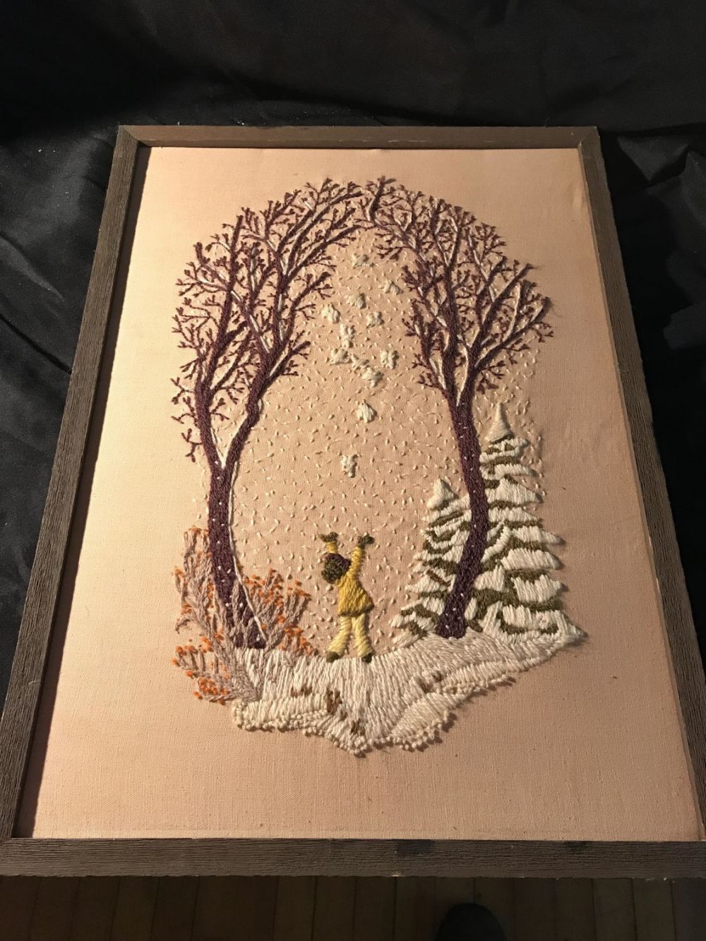 Lot 277: Embroidered scene with a child ,snow ,birds and