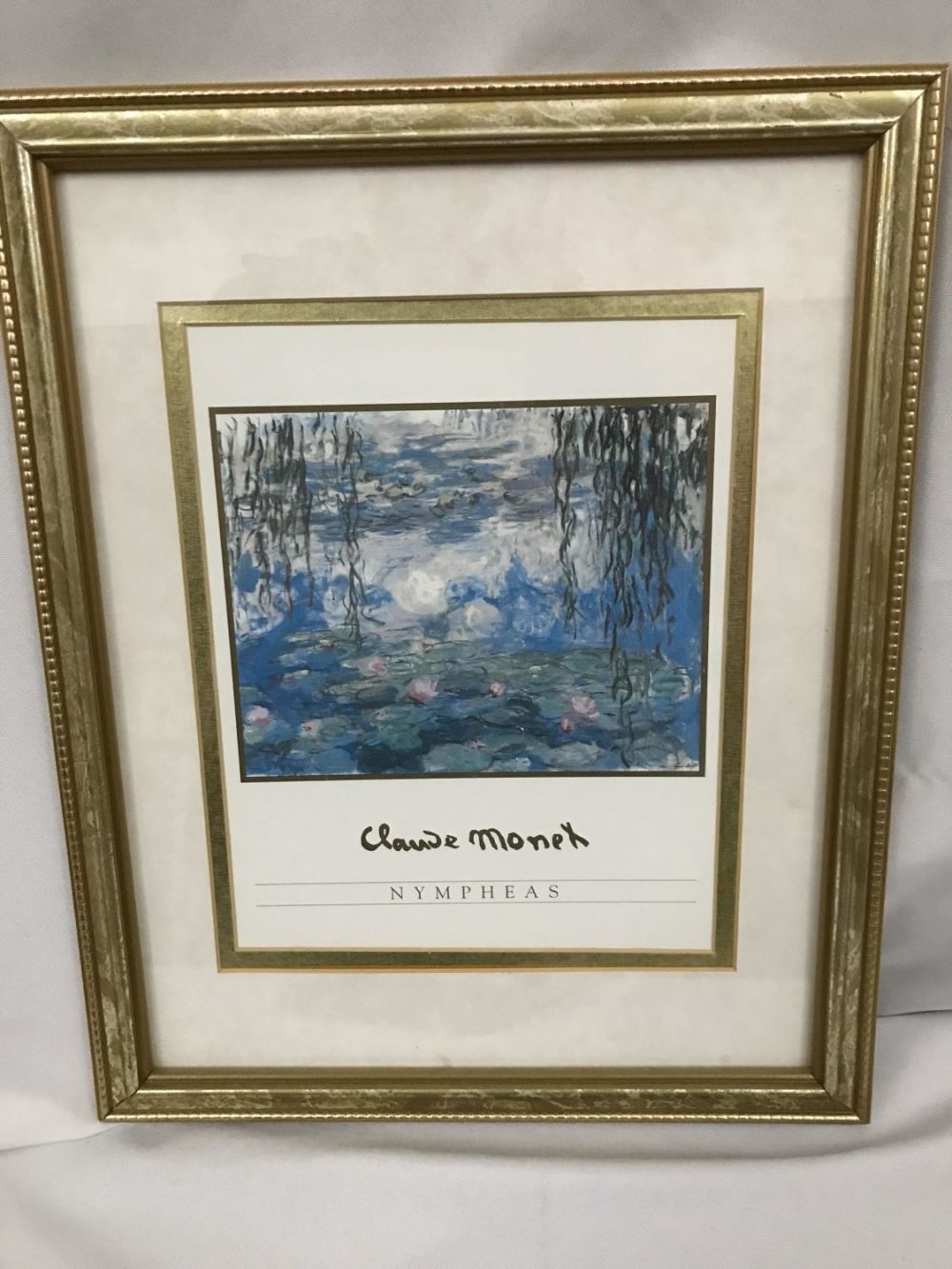 Lot 236: Claude Monet NYMPHEAS Print Framed under glass