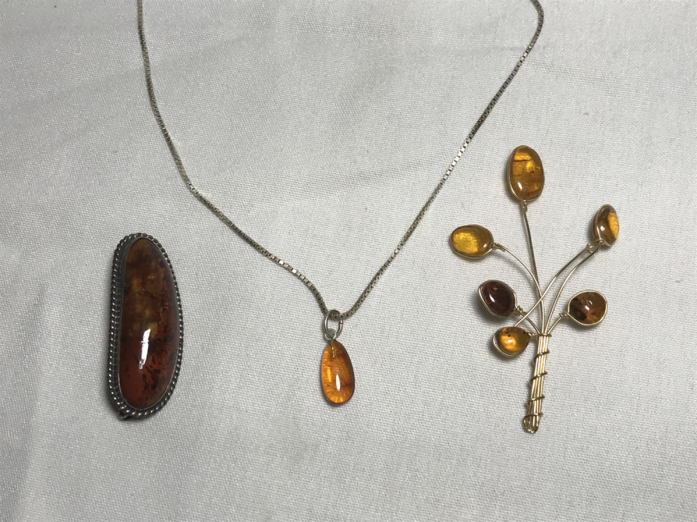 Lot 171: Amber Jewelry Lot Necklace has Sterling Chain