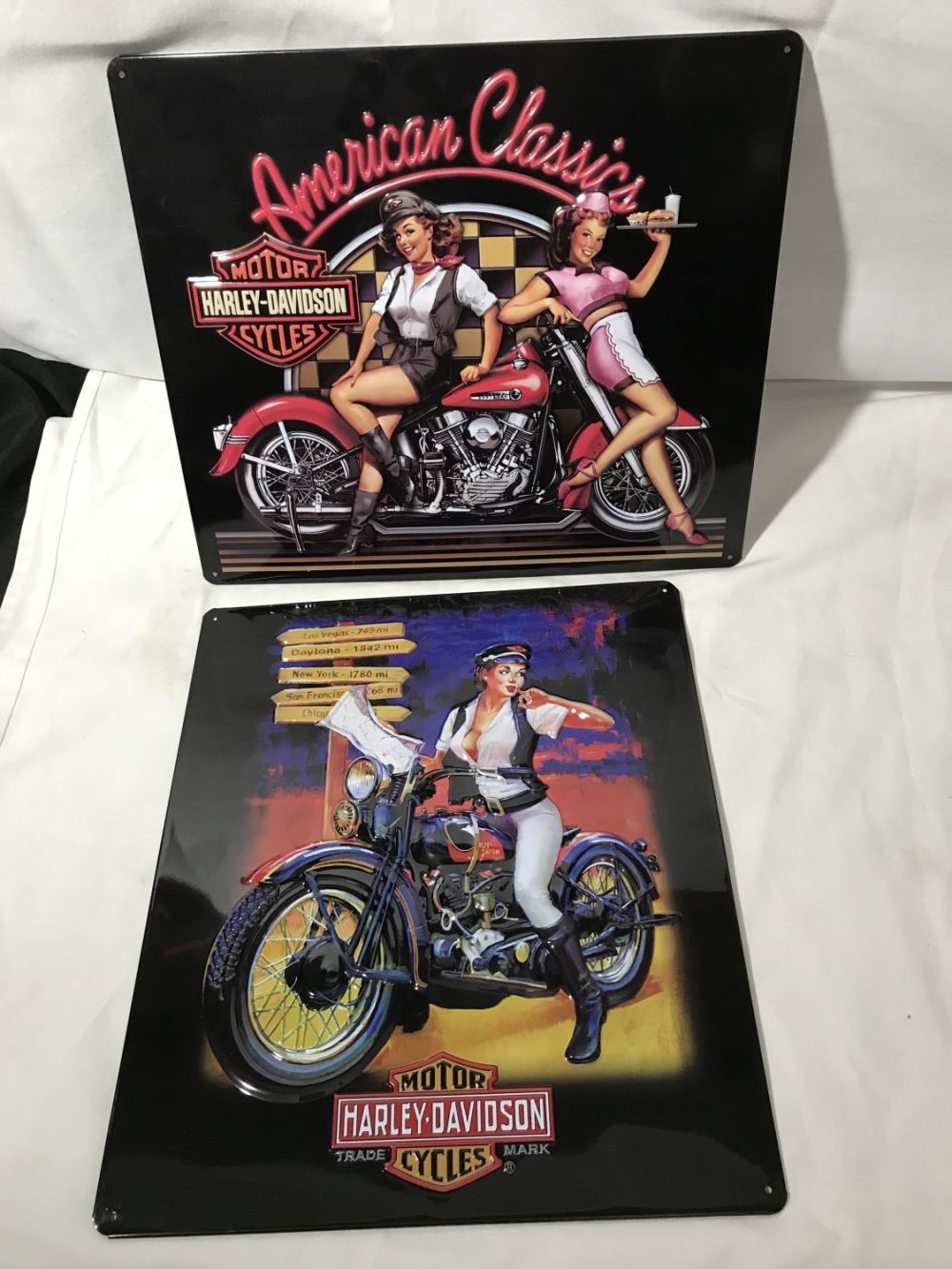 Lot 213: Harley Davidson Classic Babes Tin Signs (2)