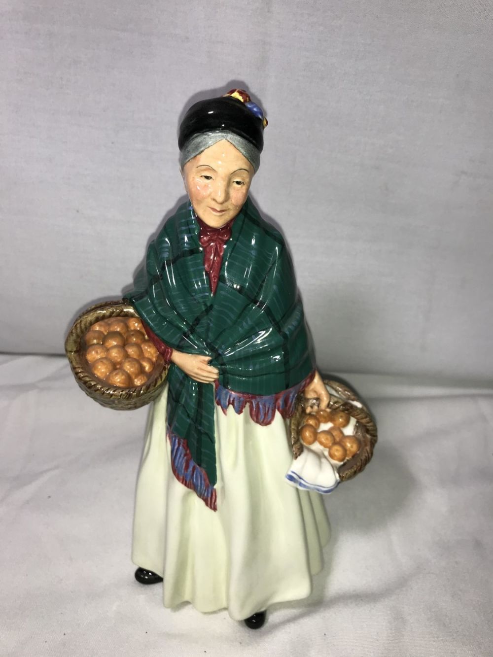 Lot 231: Royal Doulton The Orange Lady Figure
