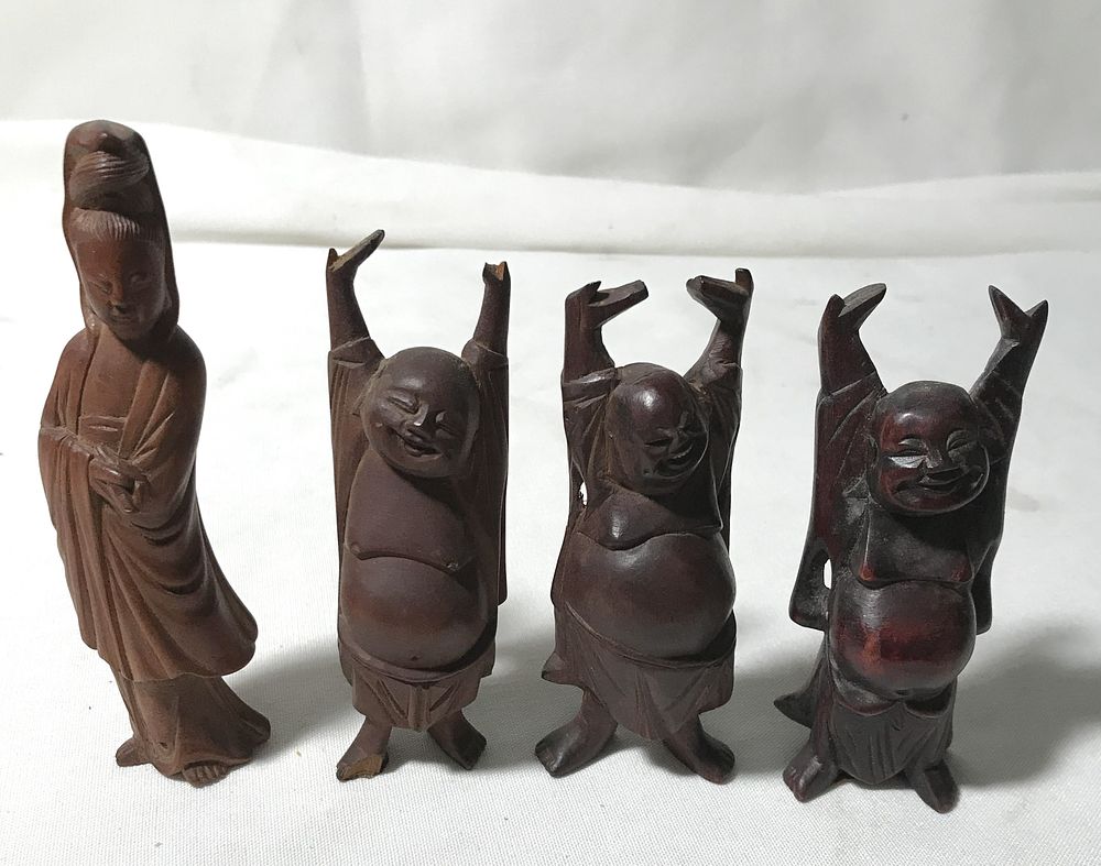 Lot 85: Hand-Carved Wooden Statues (4)