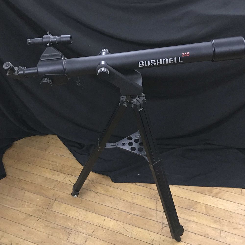 Lot 94: Bushnell 345 telescope mounted on tripod
