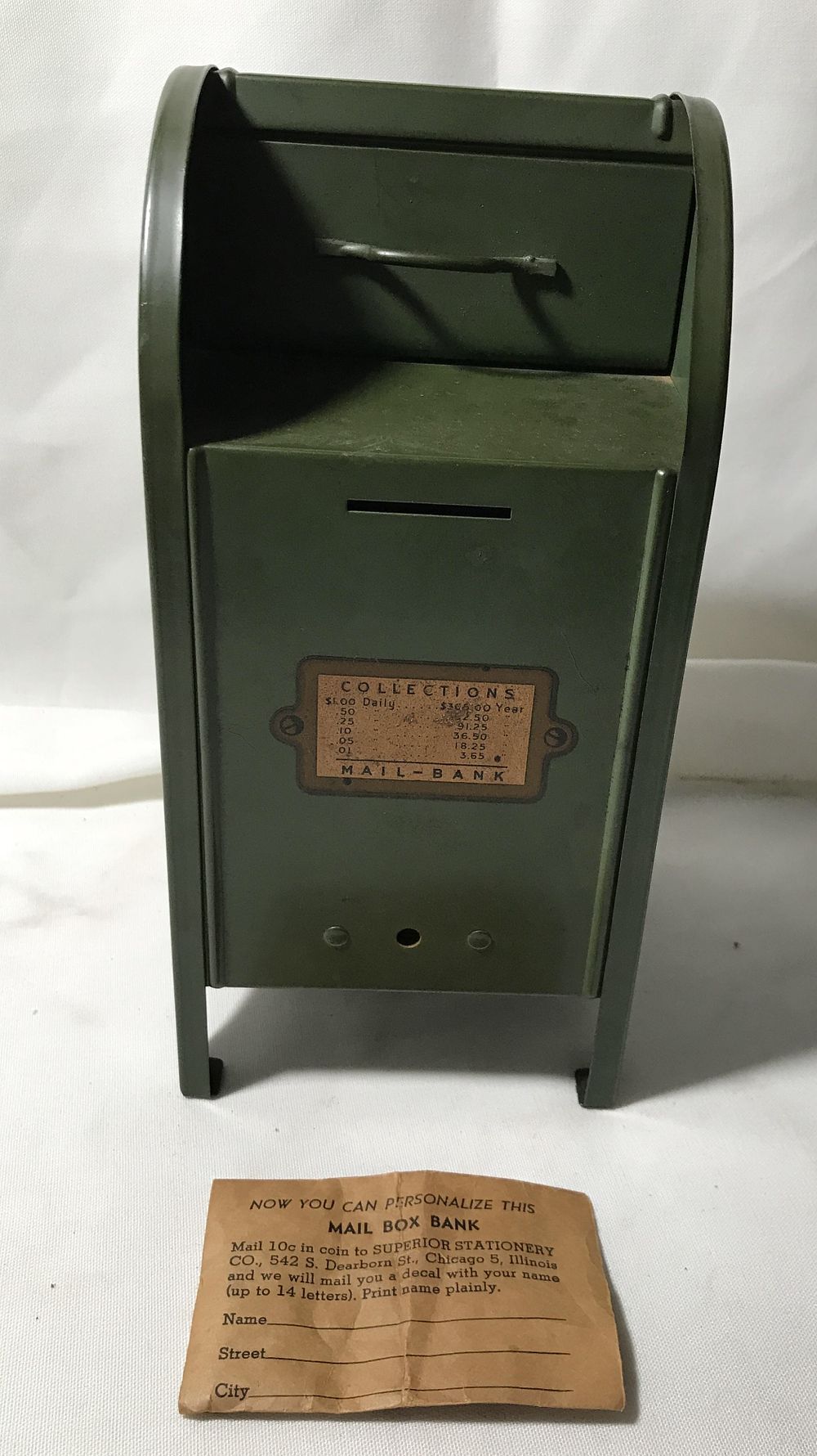 Lot 180: American Mailbox Company Green Coin Bank